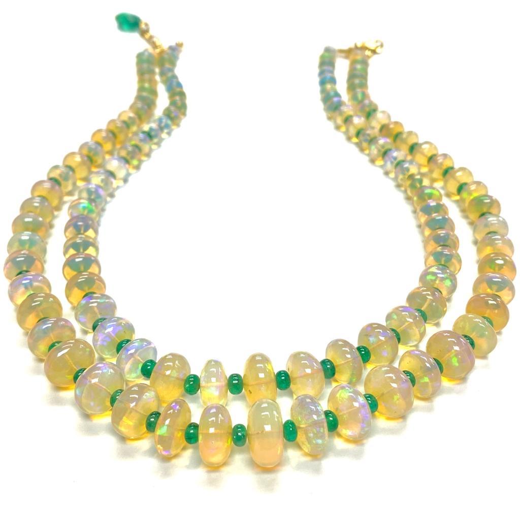 Opal and Emerald 2 strand bead Necklace in 18k Yellow Gold, from 'G-One' Collection

Stone size: 14 X 6.5 mm

Gemstone Weight: 306.87 Carats