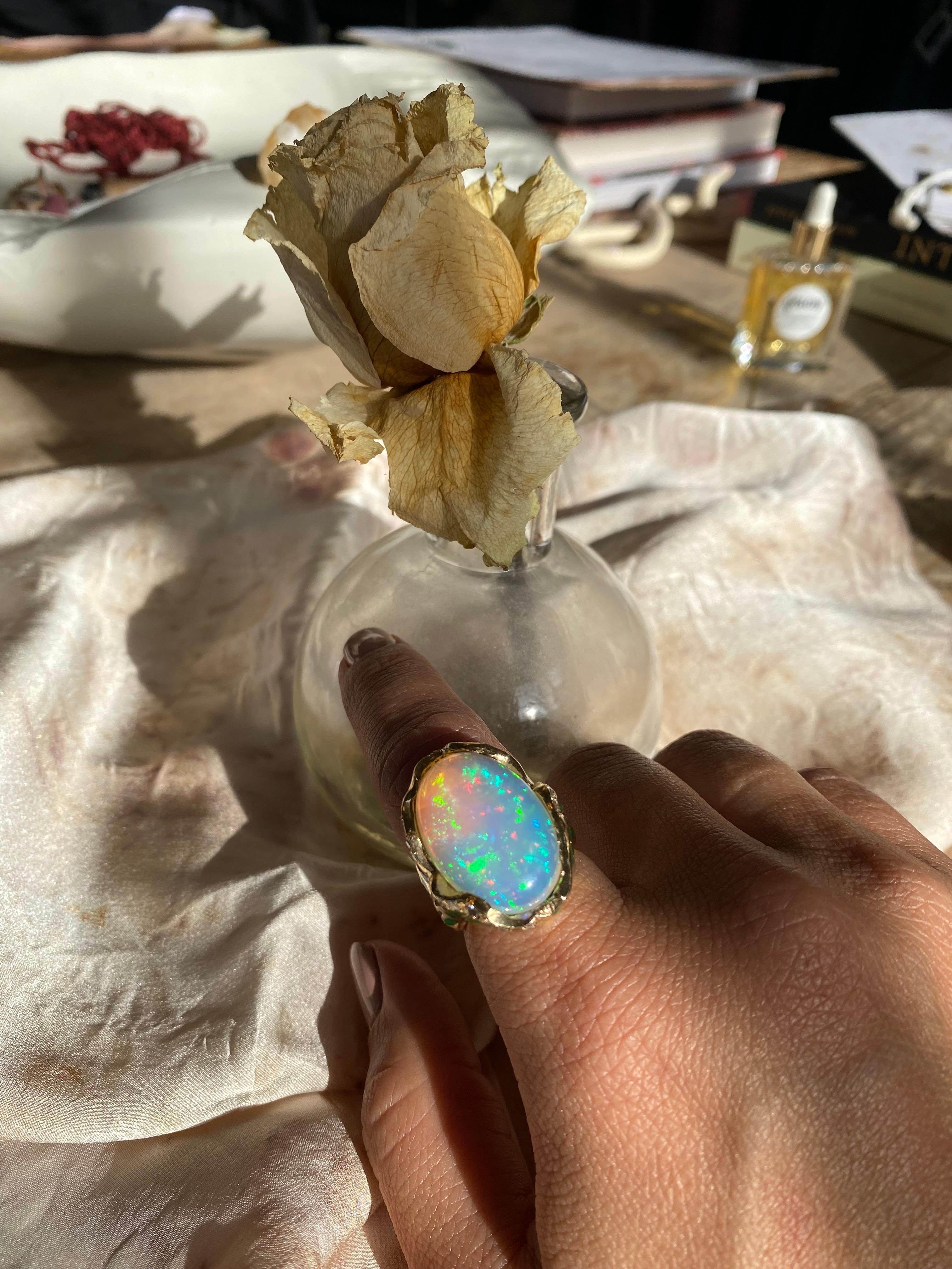 Oval Cut Opal and Plique a Jour Enamel Ring with Gold and Diamonds.