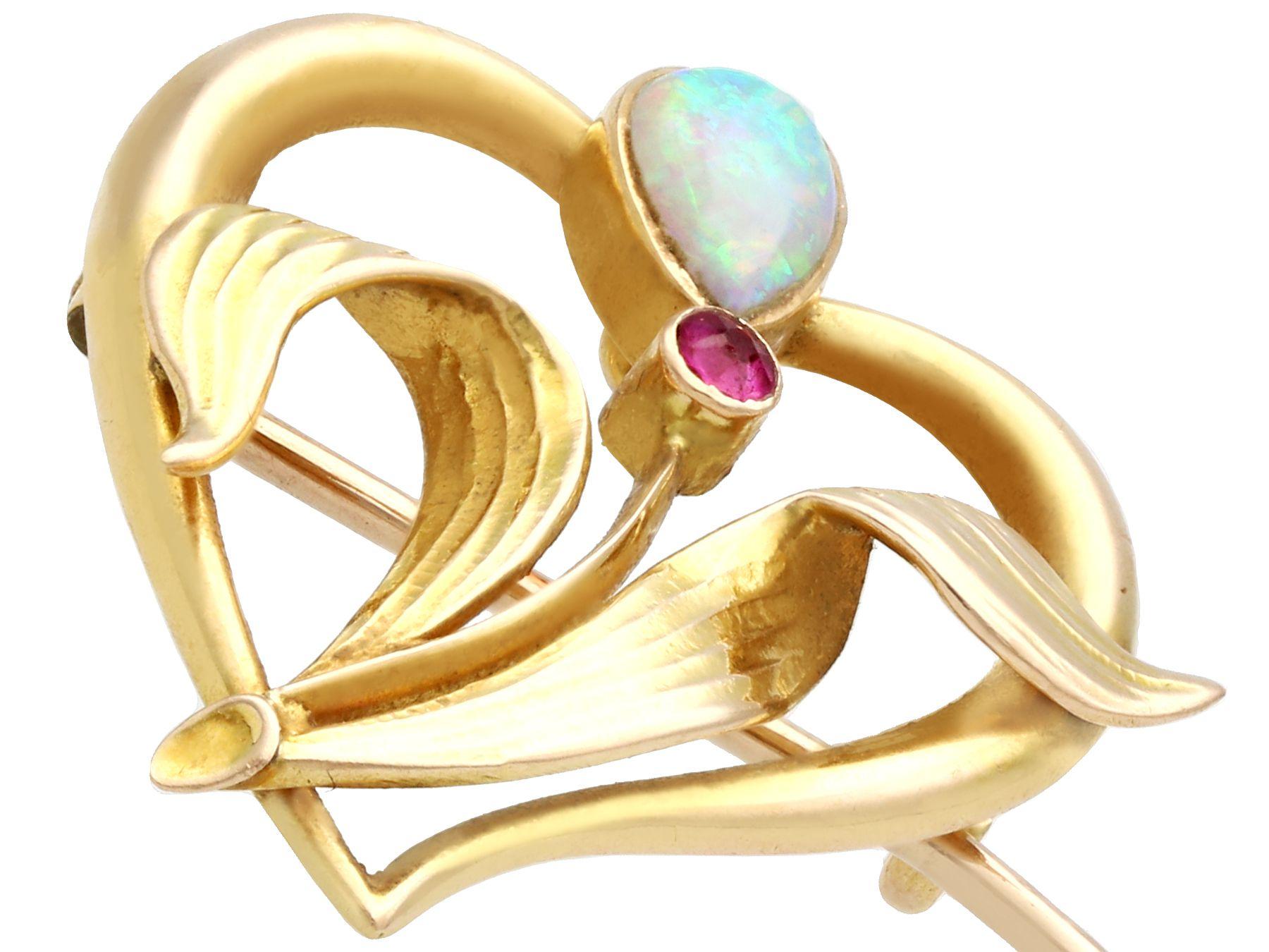 Pear Cut Antique Art Nouveau Opal and Ruby Yellow Gold Brooch, Circa 1910 For Sale