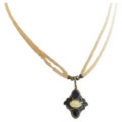 Collana in argento sterling ossidato con opale e tanzanite e diamanti da 16,5 pollici.
