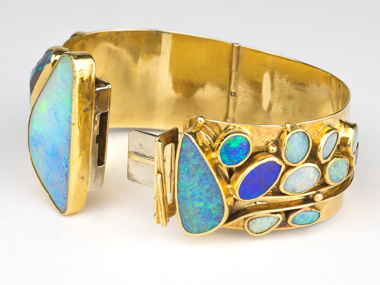 18k gold opal bangle by goldsmith Vincent Ferrini , Circa 1965.