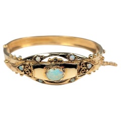 Vintage Opal Bangle in 14 Karat Gold