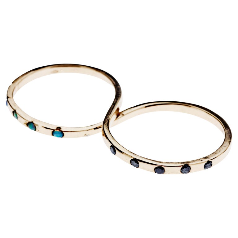 Bague à deux doigts J Dauphin en or, opale et diamant noir En