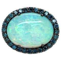 Opal, Blue Diamond and White Diamond Ring