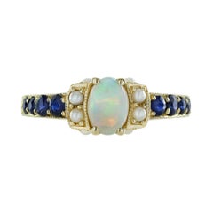 Verlobungsring aus 9 Karat Gelbgold mit Opal, blauem Saphir und Perle im Vintage-Stil