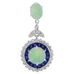 Ciondolo in oro bianco con diamante e zaffiro blu e opale in stile vintage con alone
