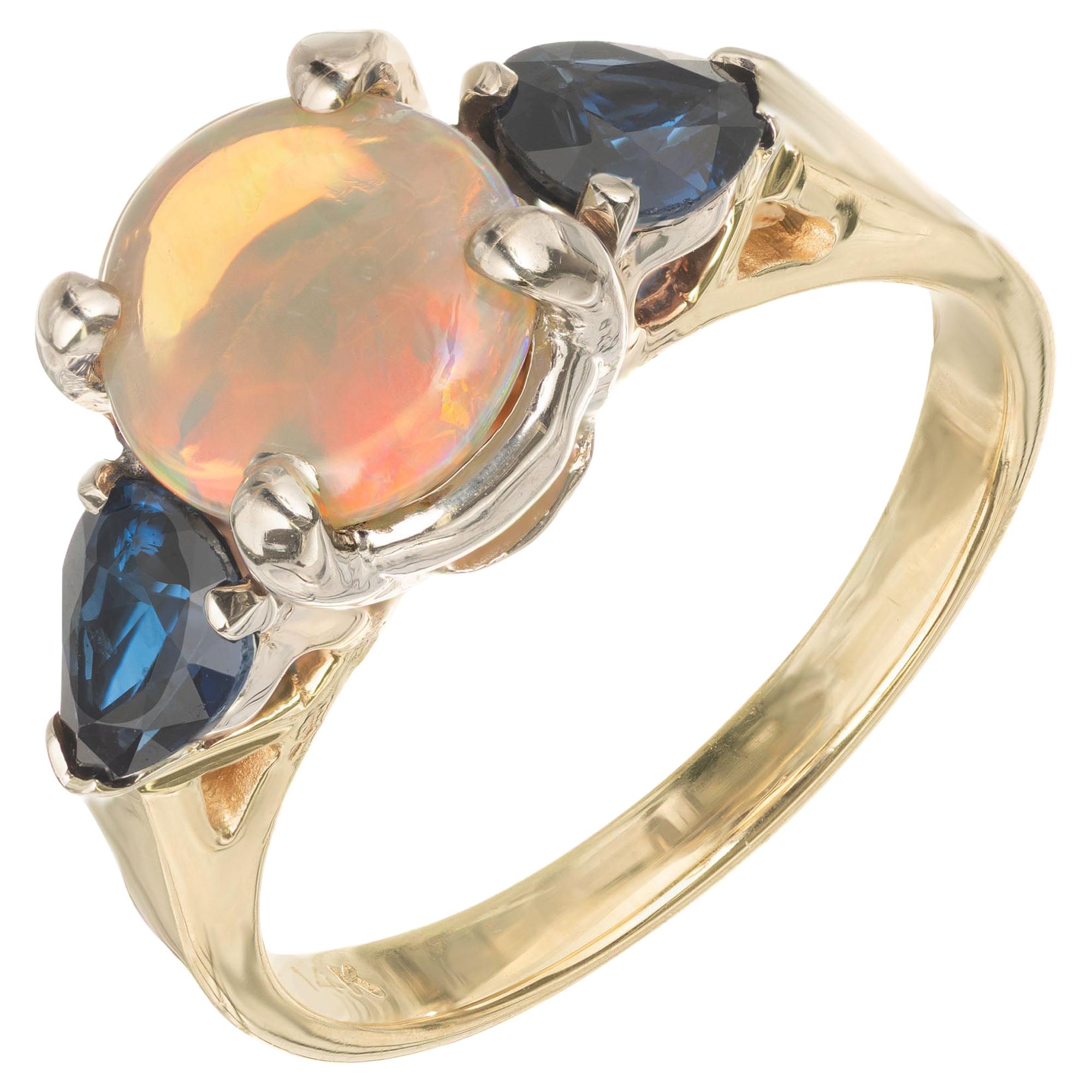 Opal Blue Sapphire Two-Tone Gold Three-Stone Engagement Ring