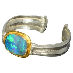 Opal Bracelet Set with 22 Karat Yellow Gold and with a Silver Cuff