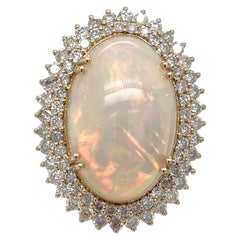 Bague fantaisie en opale cabochon et diamants