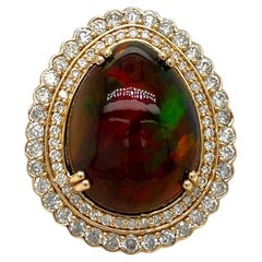 Opal Cabochon and Diamond Statement Ring