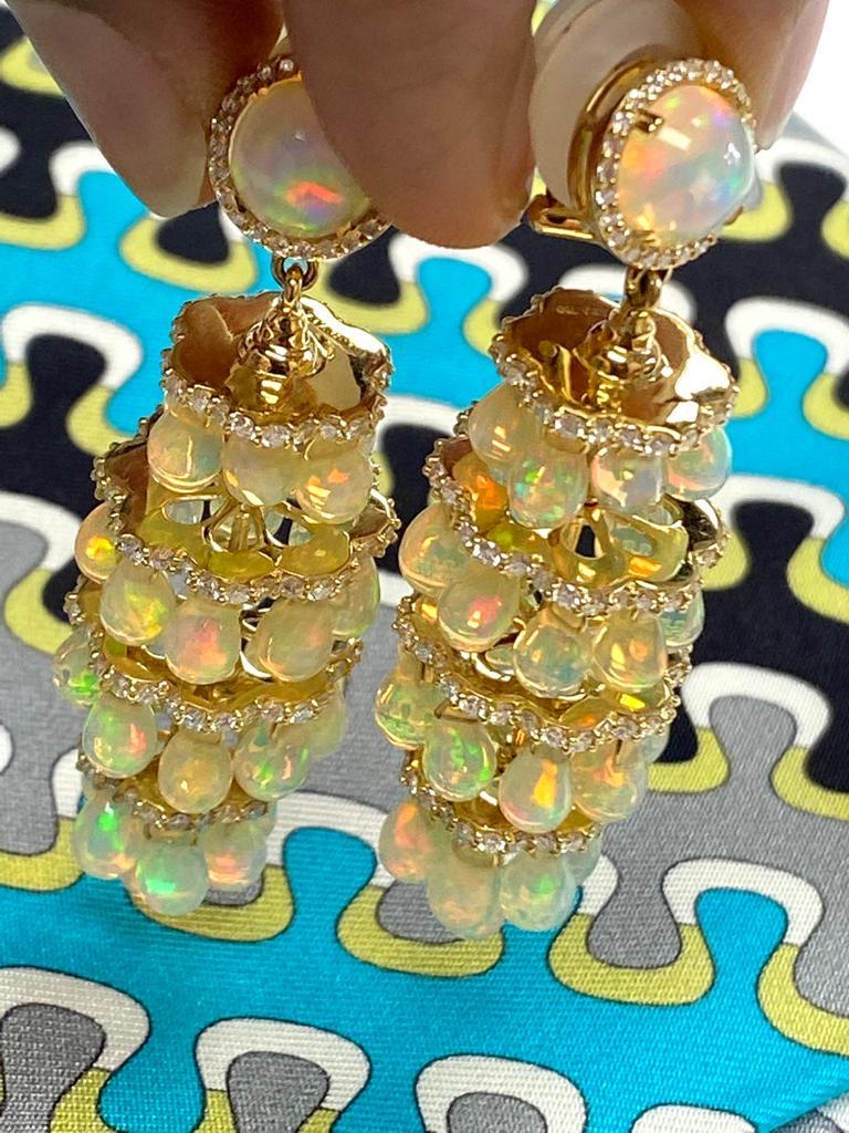 Opal Chandelier Earrings with Diamonds in 18K Yellow Gold, from 'G-One' Collection

Stone Size: 8 & 6 x 4 mm

Gemstone Wt: 37.45 Carats

Diamonds: G-H / VS, Approx Wt: 3.85 Carats