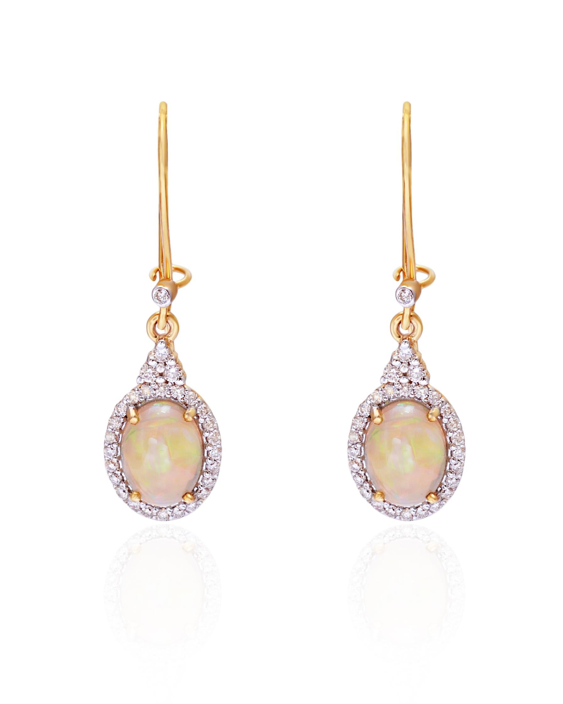 ContemporaryDrop Earrings crafted in 14K Solid Yellow Gold 0.35 Carat Natural Diamond (G-H Color, SI1 SI2 Purity) Opal Gemstone to make your daily wear an affair to remember. 

Specifications

Dimensions: 16*9 MM
Gross Weight: 2.410 gms
Gold Weight:
