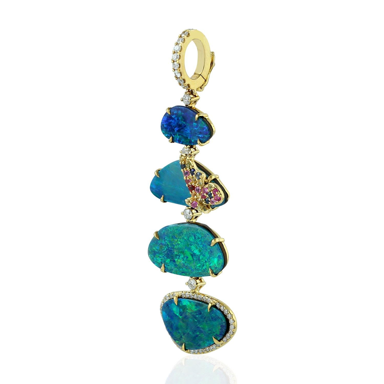 Cast in 18 Karat gold, this beautiful pendant features 6.92 carats opal, .20 carats sapphire & .36 carats of sparkling diamonds.  See other opal collection matching pieces.

FOLLOW  MEGHNA JEWELS storefront to view the latest collection & exclusive