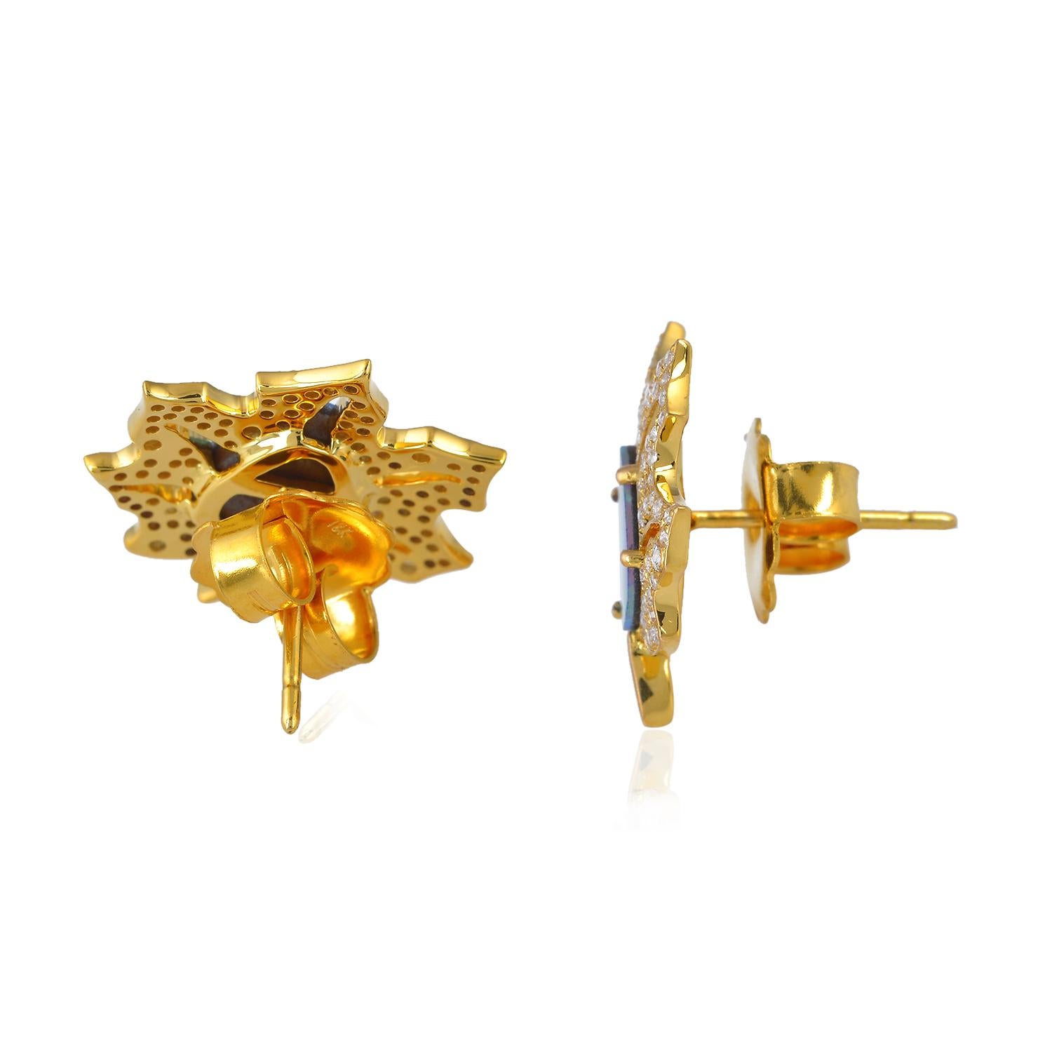 Cast in 18 karat gold, these beautiful stud earrings are hand set with 2.25 carats opal doublets & .79 carats of diamonds 

FOLLOW  MEGHNA JEWELS storefront to view the latest collection & exclusive pieces.  Meghna Jewels is proudly rated as a Top