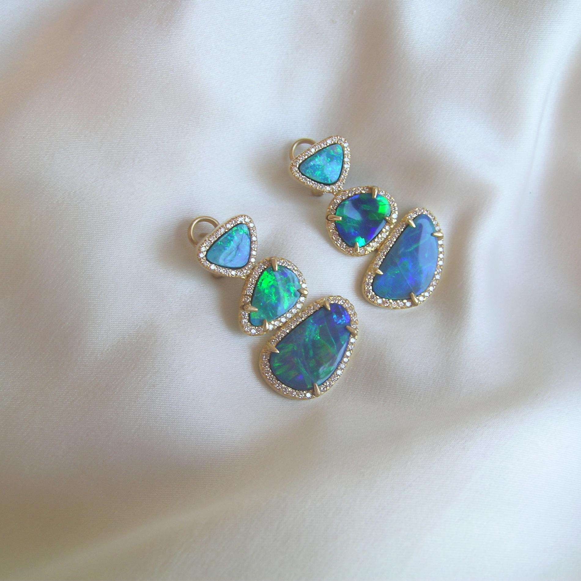 Colorful!  That is the one word to describe these Boulder Opal & Diamond Earrings.  The Opals are from Australia, the earrings are from Nancy Phillips.  There are many ways to describe these earrings from colorful to fun to luxurious.  Talk about a