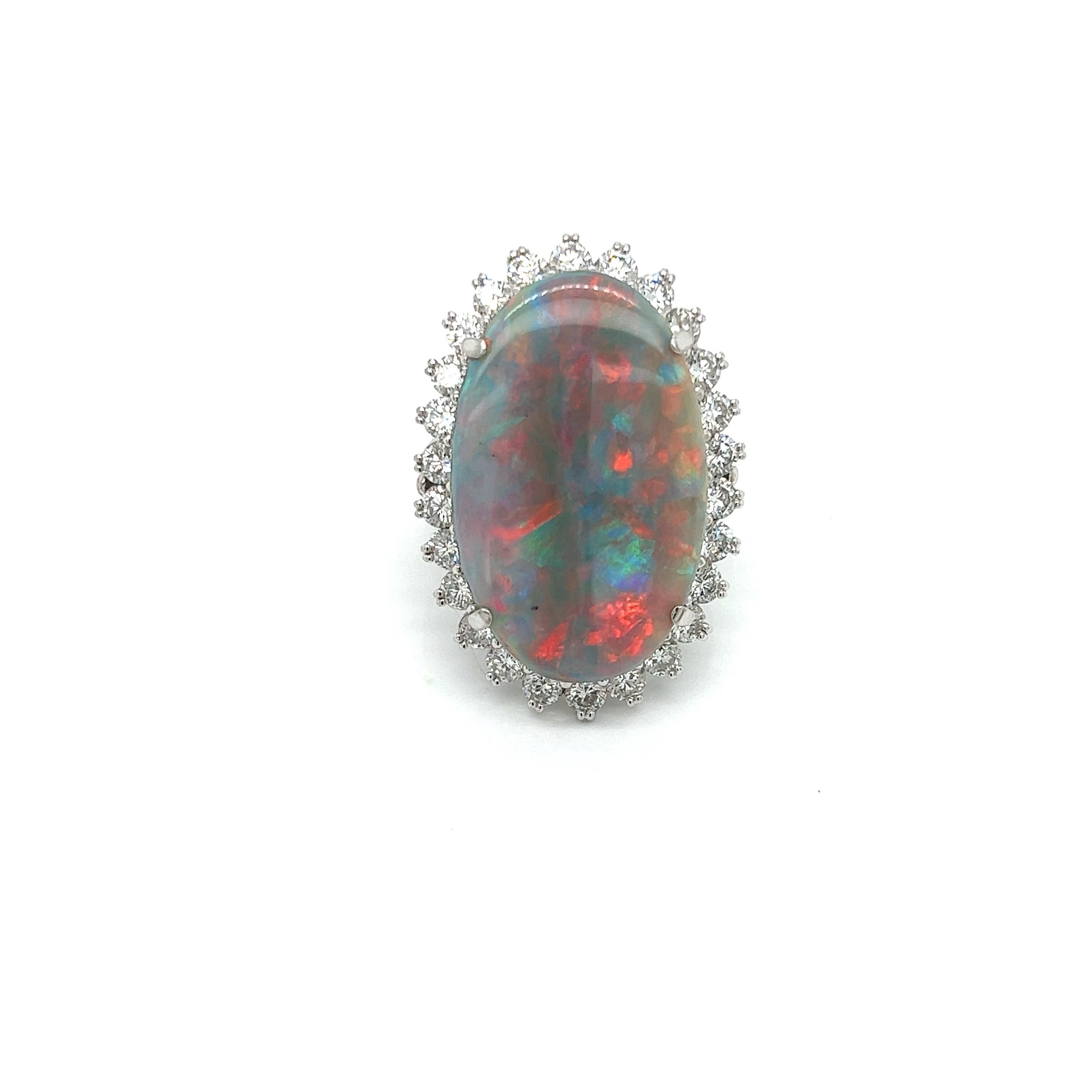 Women's Opal, Diamond and Platinum Halo Ring For Sale