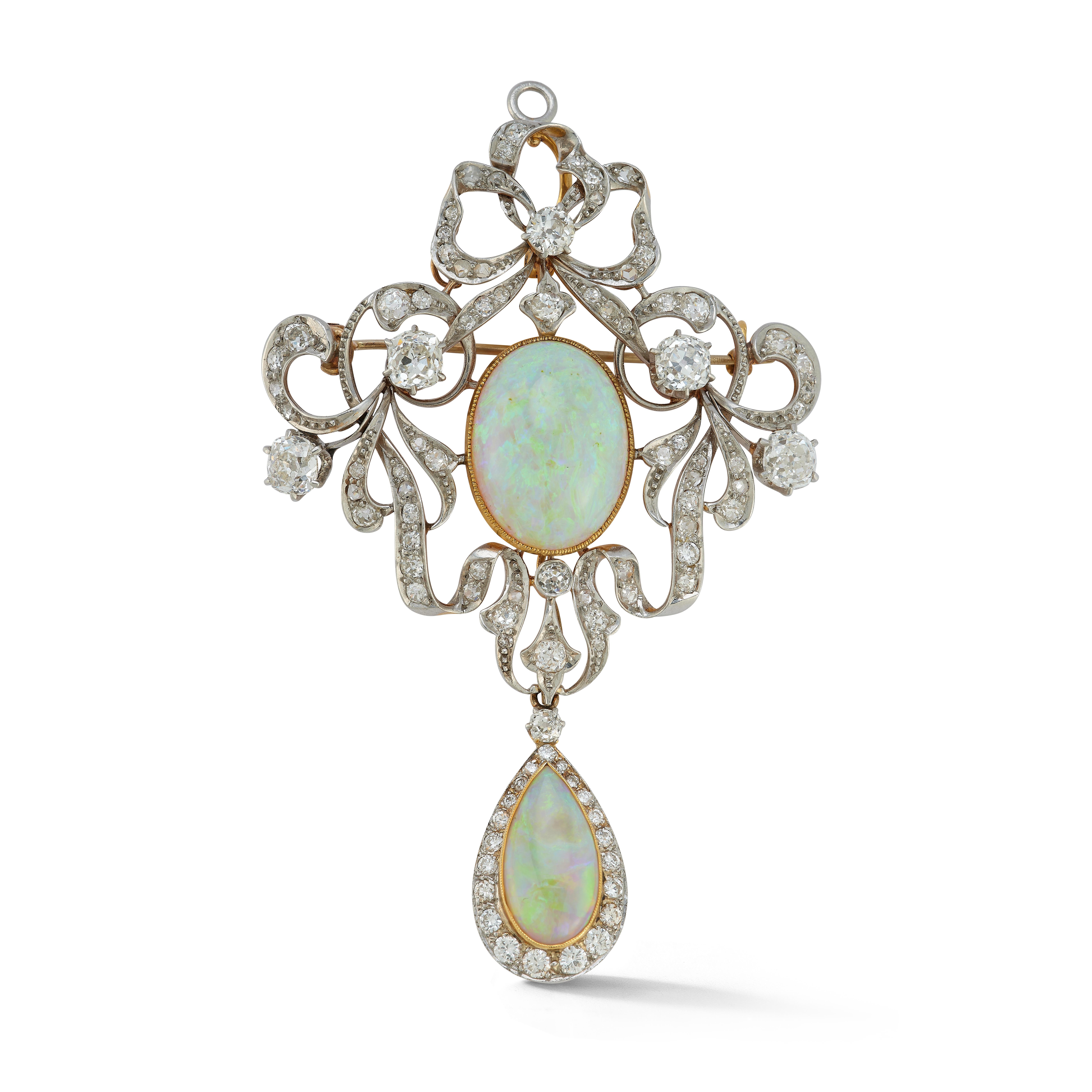 Opal & Diamond Brooch

1 center opal surrounded by 5 large old mine diamonds & 91 small round cut diamonds, suspending a  pear shape cabochon opal set with round cut diamonds 

Center Opal Weight: approximately 15.00 carats
Opal Drop Weight: