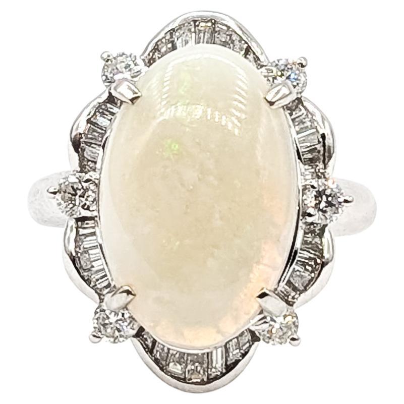 Anello cocktail con opale e diamanti in platino