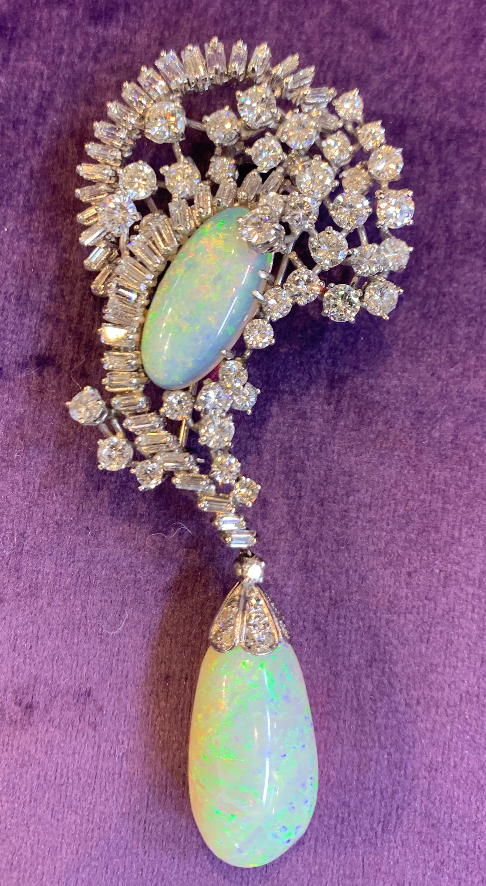 Opal & Diamond Drop Brooch set in Platinum
Approx Opal drop Weight: 26.32 Cts 
Approx Oval Opal: 6.00 Cts
Approx Diamond Weight: 8.59 Cts
Measurements: 3.5 inches in length
