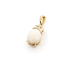Opal & Diamond Drop Pendant in 14K Yellow Gold