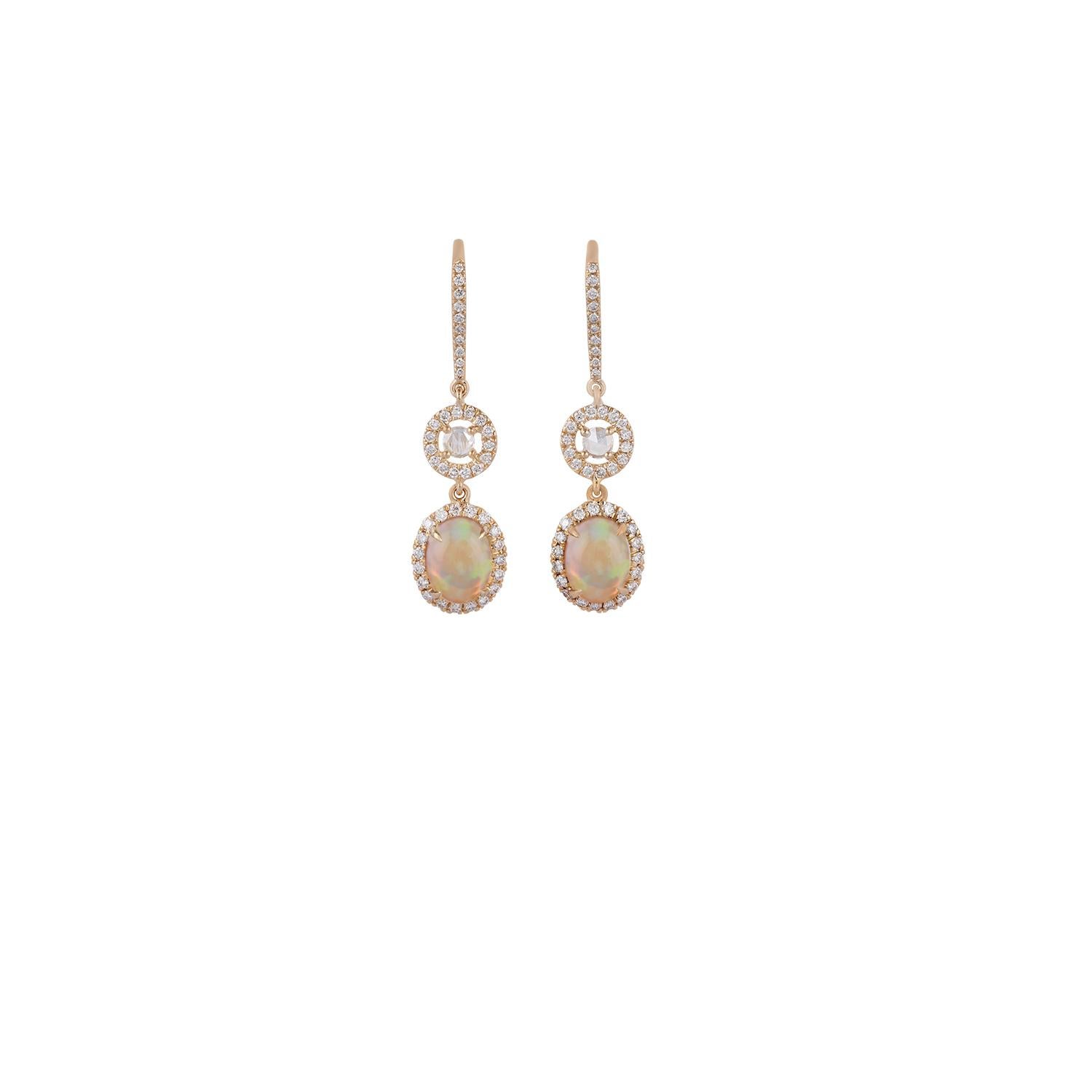 These are an elegant opal & diamond earrings studded in 18k yellow gold features 2 pieces of cabochon shaped opals weight 2.11 carat with 2 pieces of rose cut diamond weight 0.15 carat & 88 pieces of round shaped brilliant cut diamonds weight 0.74