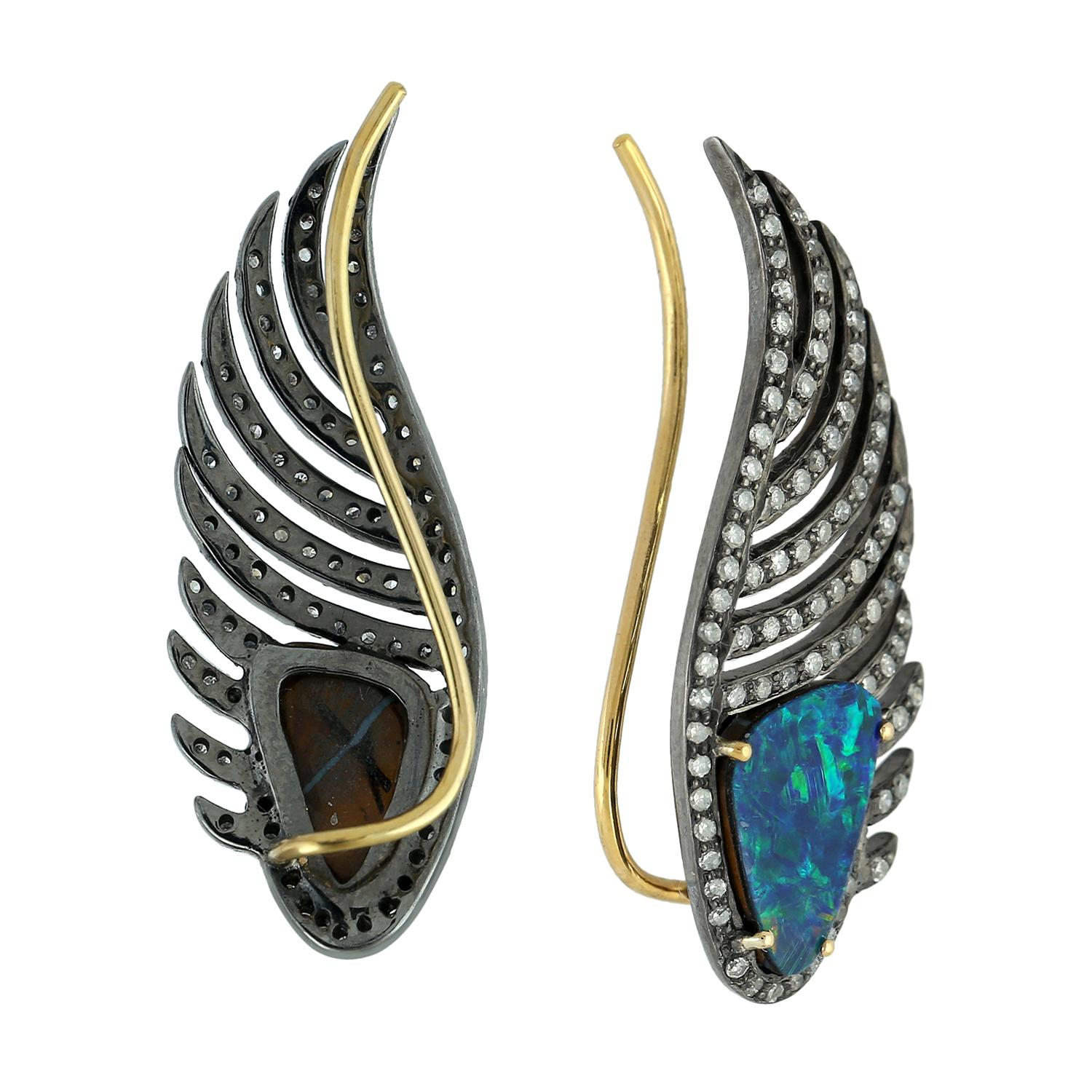 These feather ear climbers are handmade in 18-karat gold and sterling silver. It is set with 3.0 carats opal doublets & .71 carats of glimmering diamonds.

FOLLOW  MEGHNA JEWELS storefront to view the latest collection & exclusive pieces.  Meghna