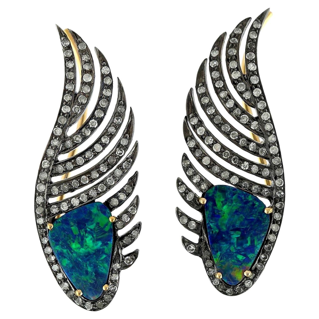 Boucles d'oreilles pendantes plumes en opale et diamants