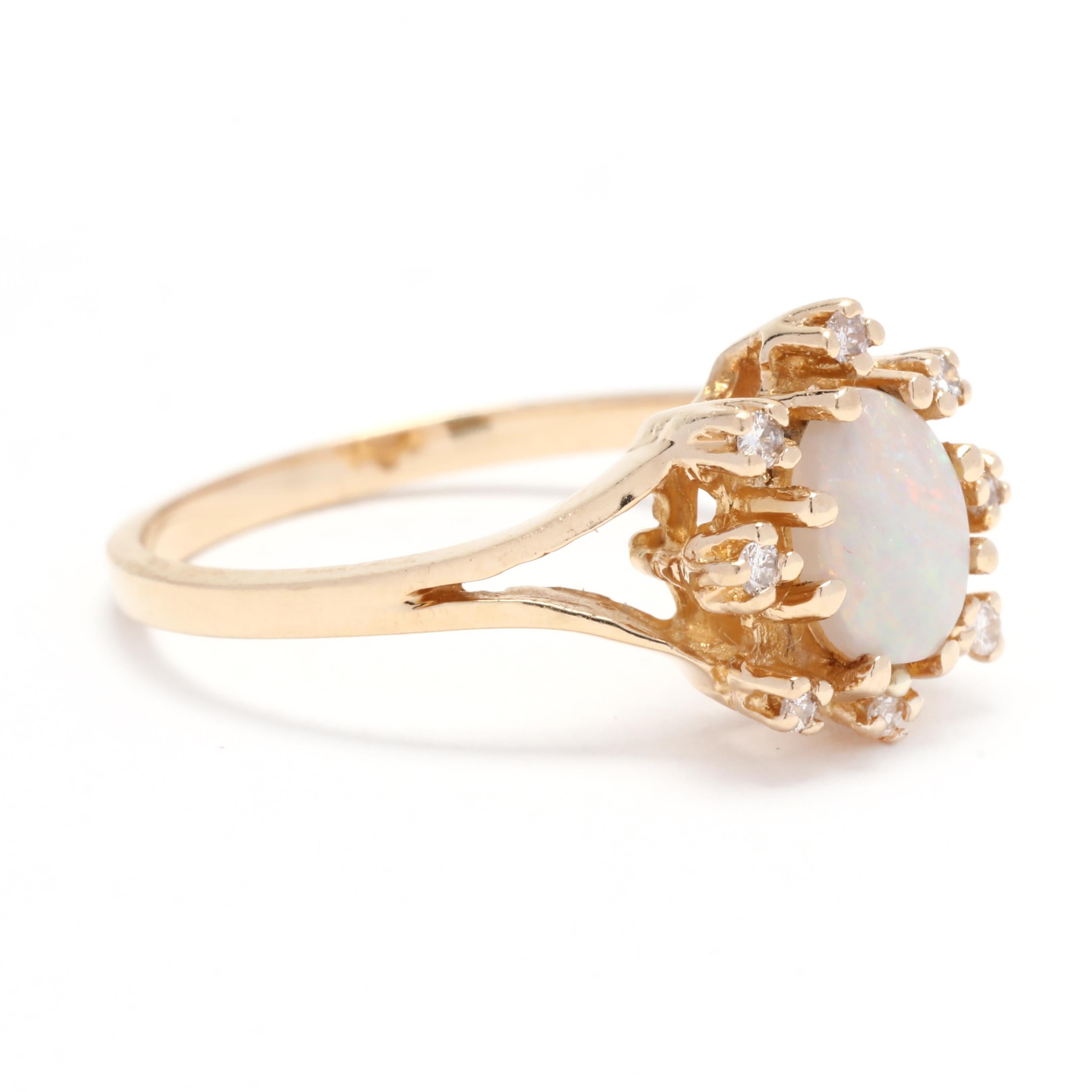 This gorgeous opal diamond halo ring is a true showstopper that will add a touch of sparkle and color to any outfit. Crafted in 14K yellow gold, the ring features a 0.53 carat oval-shaped opal at the center. The opal is surrounded by a halo of