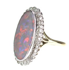 Opal and Diamond, Oval Shape Cluster Ring in Rub over Setting in 18 Karat Gold