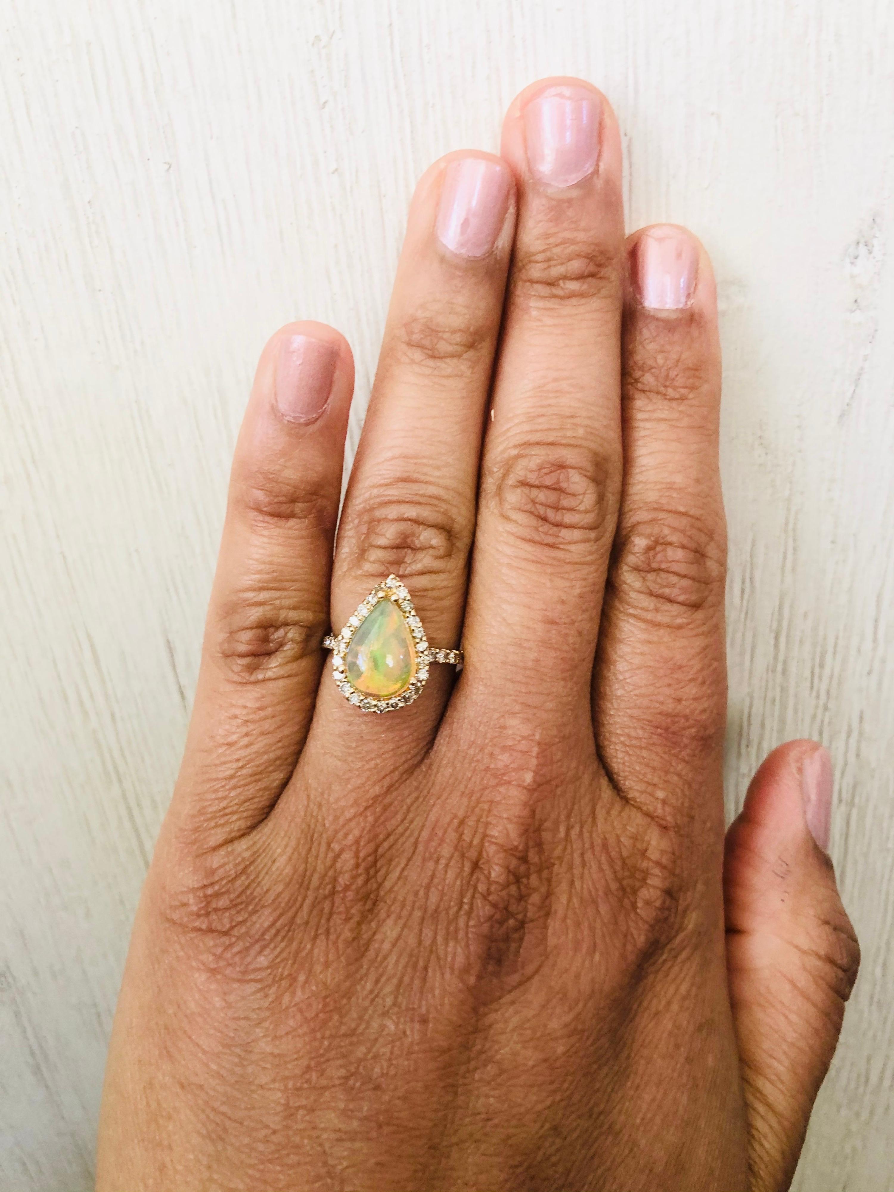 Women's Opal Diamond Pear Cut 14 Karat Yellow Gold Ring