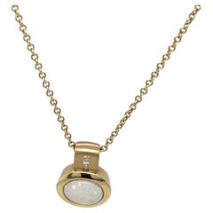 Ciondolo con opale e diamante incastonato in oro giallo 18ct