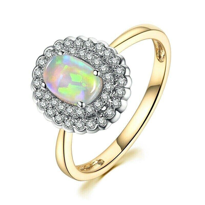 

This Ethiopian Opal Ring shows off bright flashes of color Yellow Blue Green White etc.  And stands out with the 50 natural diamonds 

Ethiopian Opal is a new variety of opal discovered in Wollo province of Ethiopia. It is highly valued for its