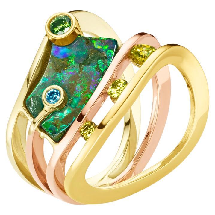 Anello con opale e diamanti in oro misto