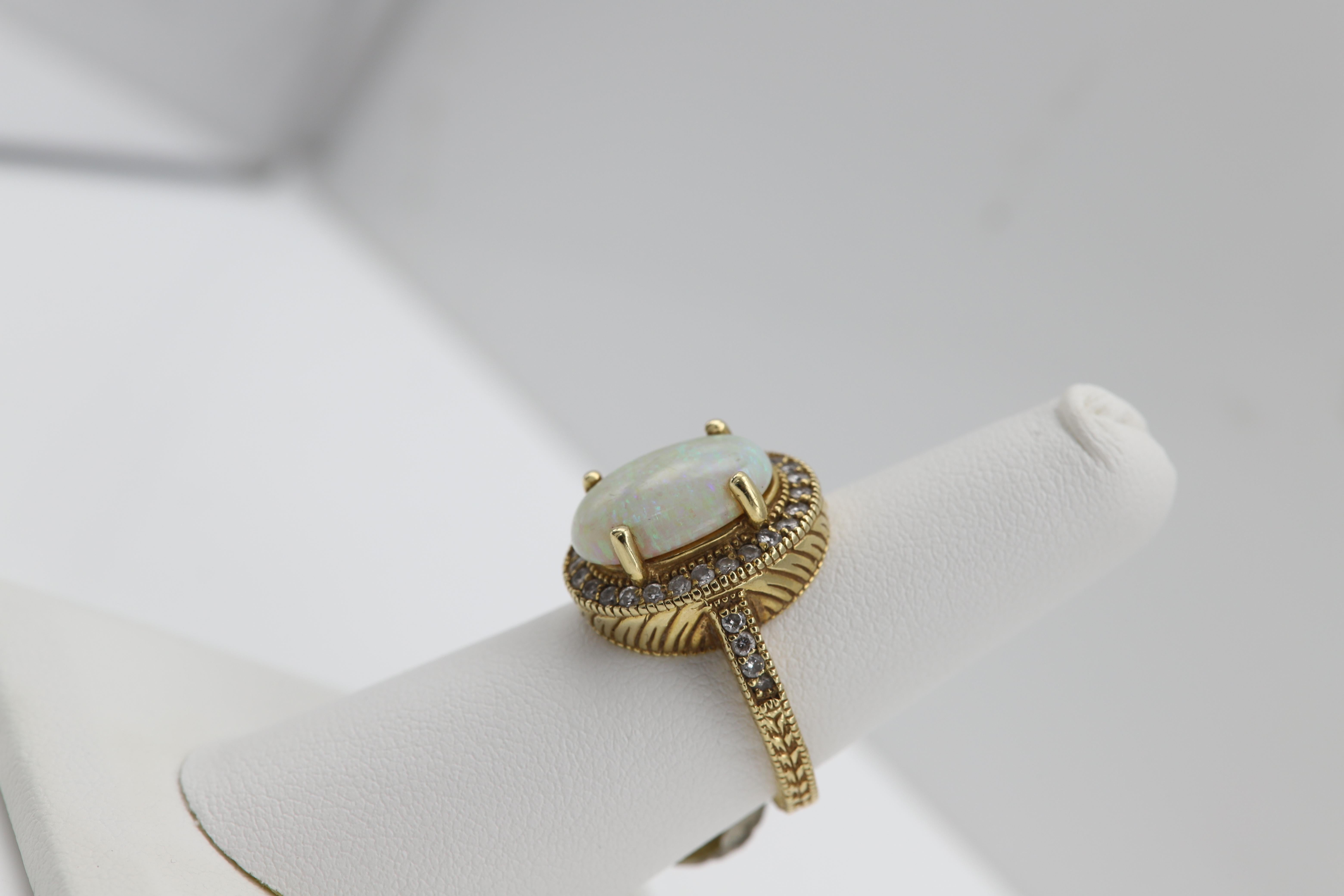 Opal Diamond Ring Circa 1960's 14k Yellow Gold Vintage Opal jewelry In Excellent Condition For Sale In Brooklyn, NY