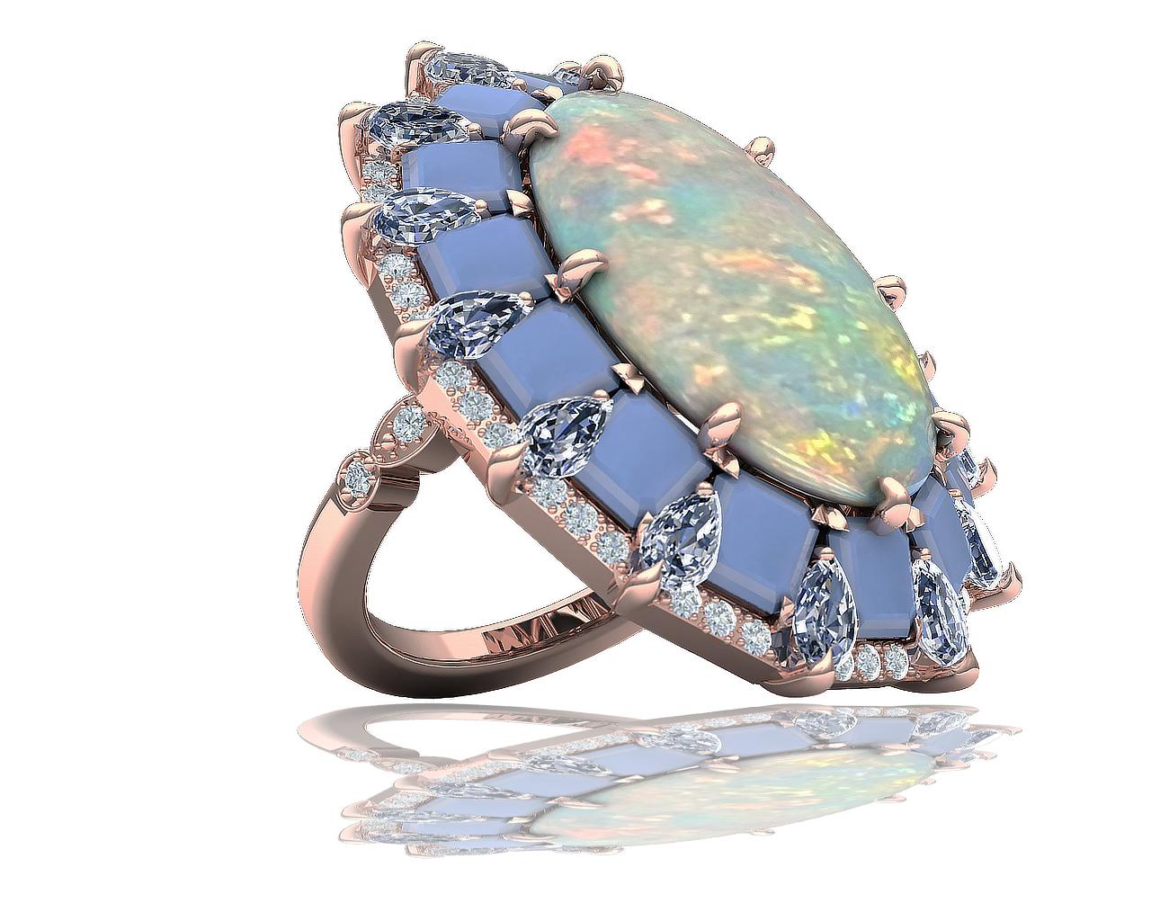 A true measure of creativity with color hue combinations.  This opal diamond cocktail ring has a truly stunning center stone at just over 5 carats and a stunning matrix.  This Australian opal has tones of green to orange with light ridges of pink