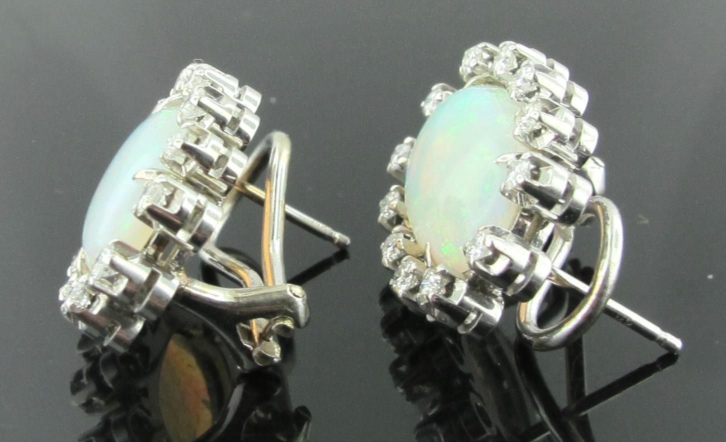 Opal Earrings Set in 14 Karat White Gold Surrounded with Diamonds In Excellent Condition In Palm Desert, CA