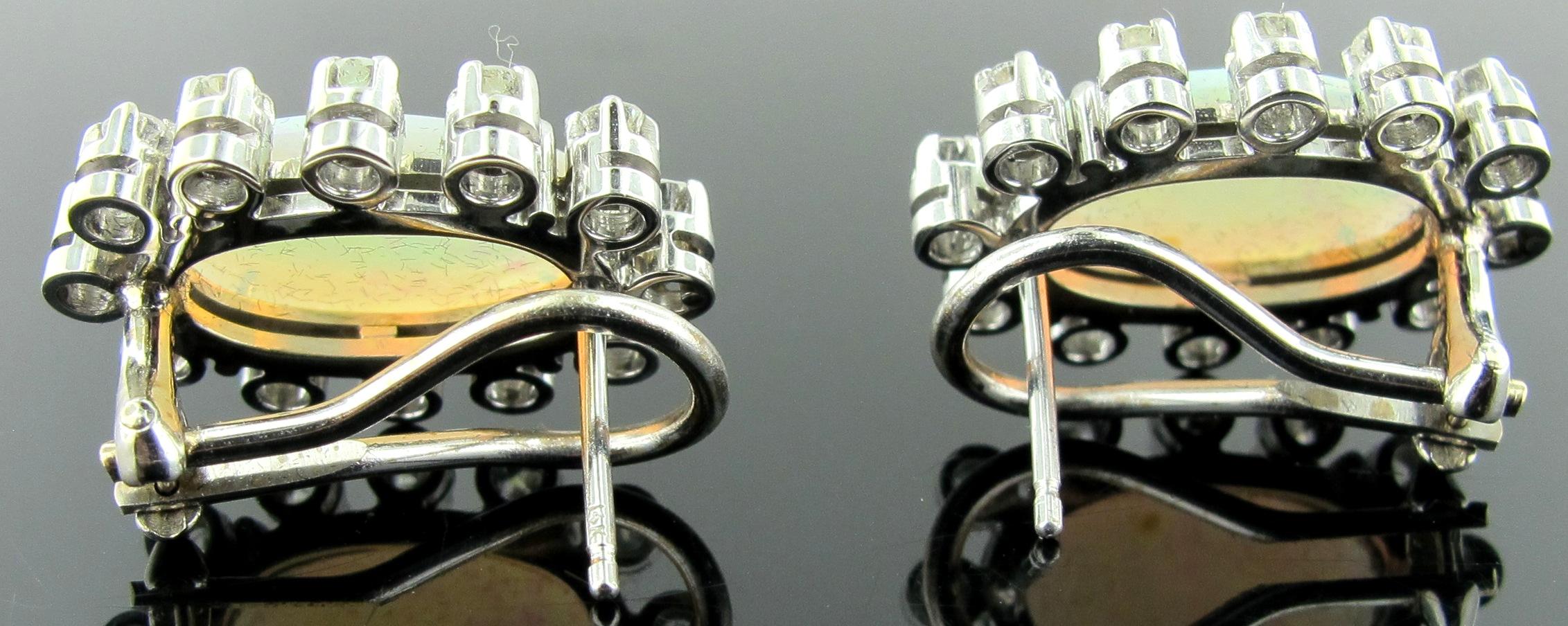 Women's or Men's Opal Earrings Set in 14 Karat White Gold Surrounded with Diamonds