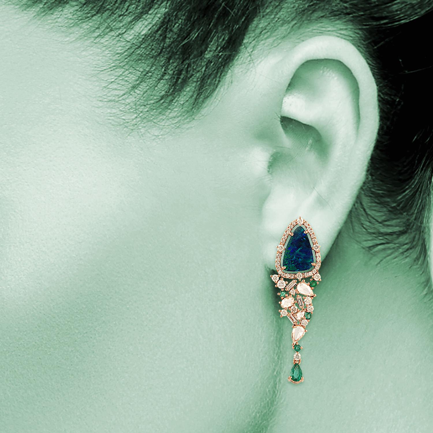 Handcrafted from 18-karat gold, these exquisite drop earrings are set with 3.41 carats Opal, .68 carats emerald and 1.78 carats of glimmering diamonds. Made to Order.

FOLLOW  MEGHNA JEWELS storefront to view the latest collection & exclusive