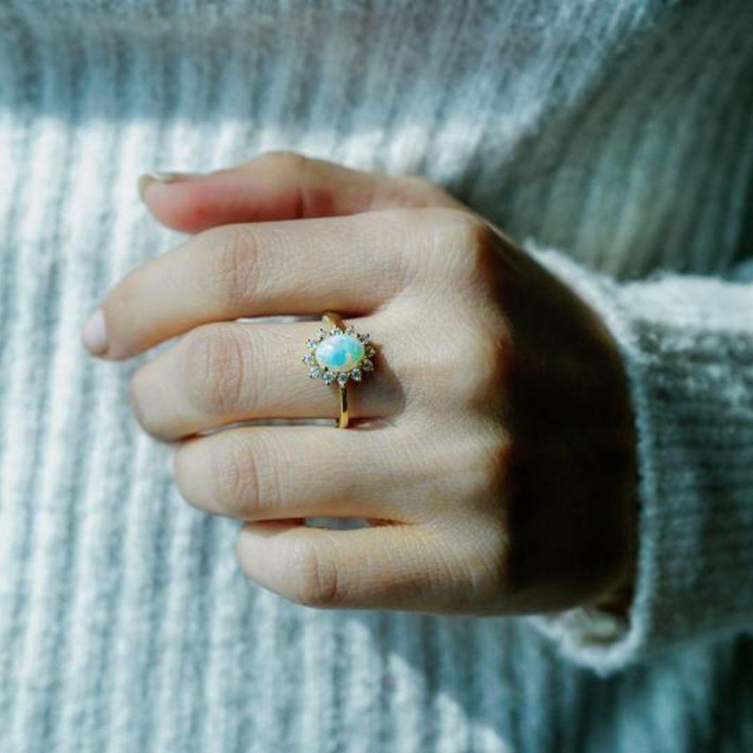 dainty opal engagement ring