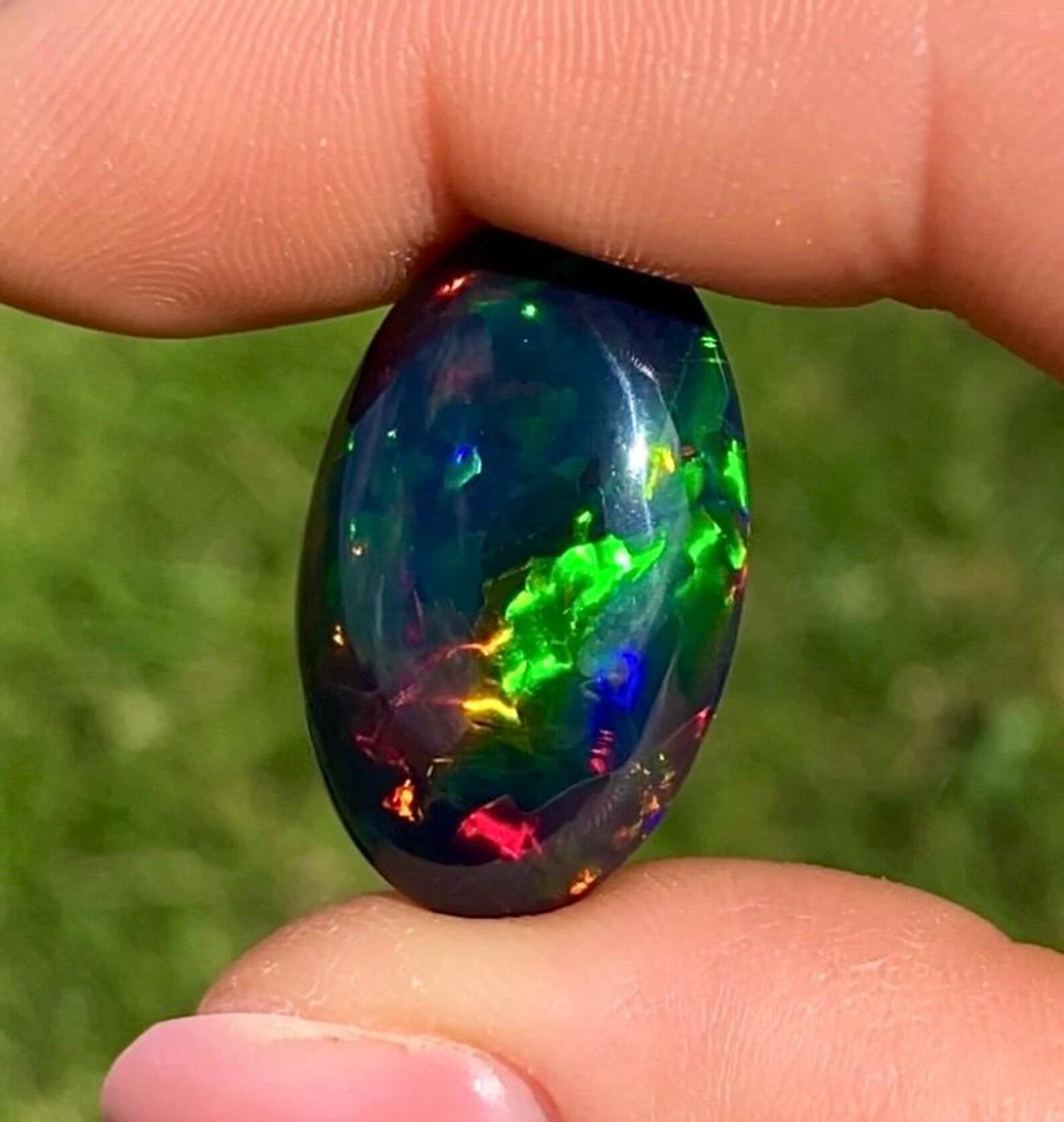 Natural Ethiopian Opal gemstone
GFCO laboratory certified

Gemstone Color: Black Multicolor
Gemstone Type: Opal
Gemstone size: 27.27x17.09x8.44mm
Cut Grade: Very Good
Gemstone Shape: Oval Cabochon
Gemstone Creation: Natural
Gemstone Treatment: