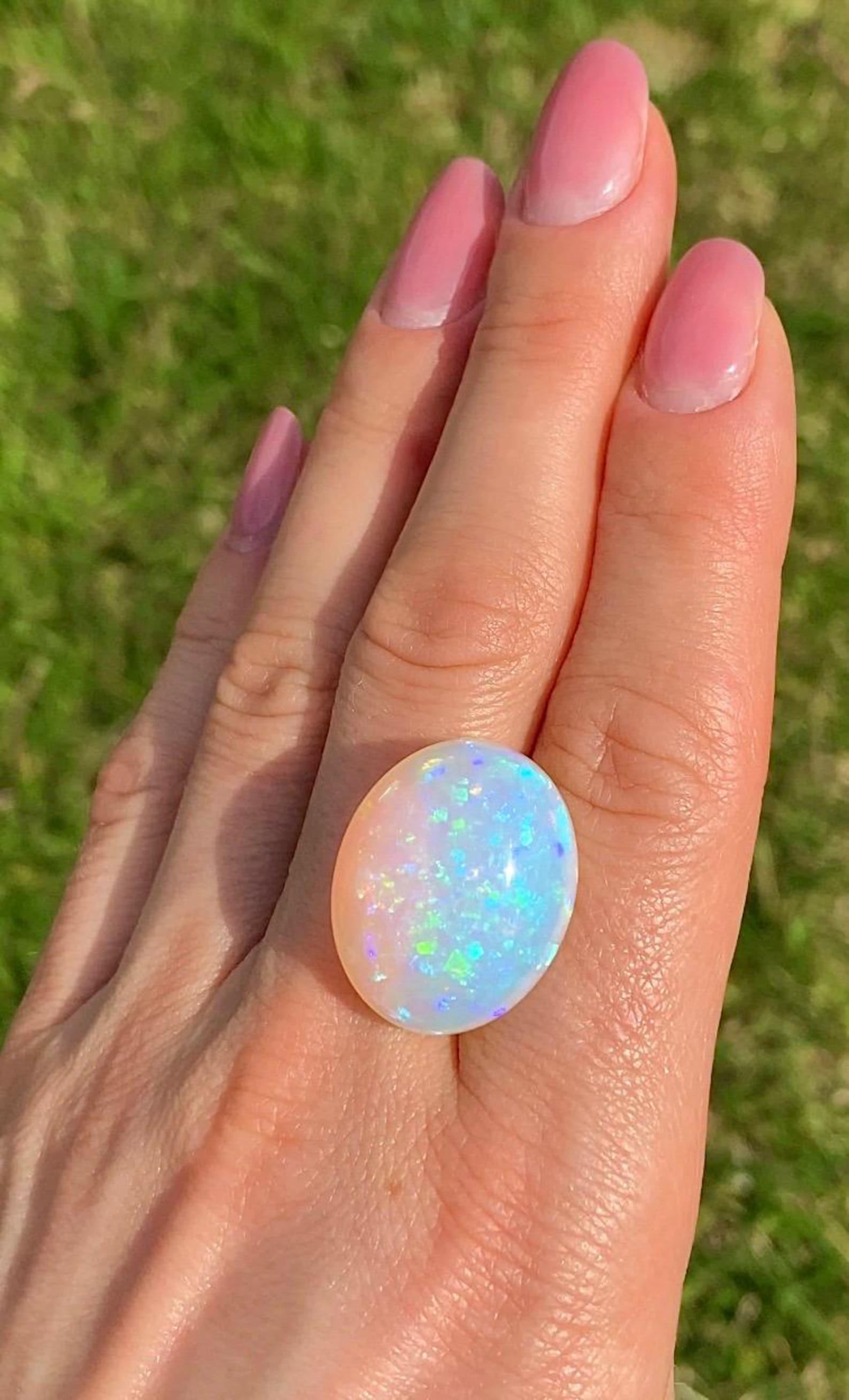 Opal Ethiopian 16.94Ct natural gemstone, Oval cabochon, , Certificate GFCO For Sale 2