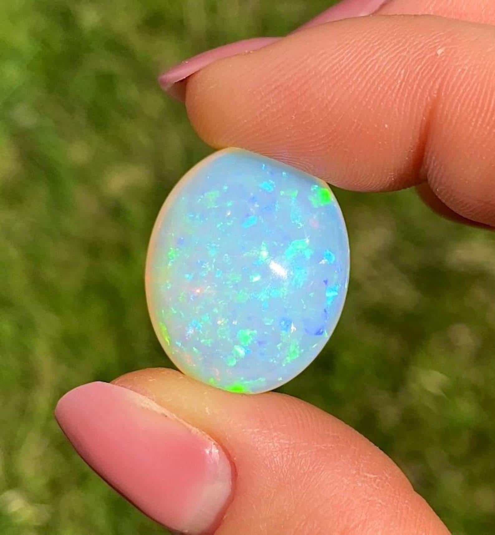 Opal Ethiopian 16.94Ct natural gemstone, Oval cabochon, , Certificate GFCO For Sale 3