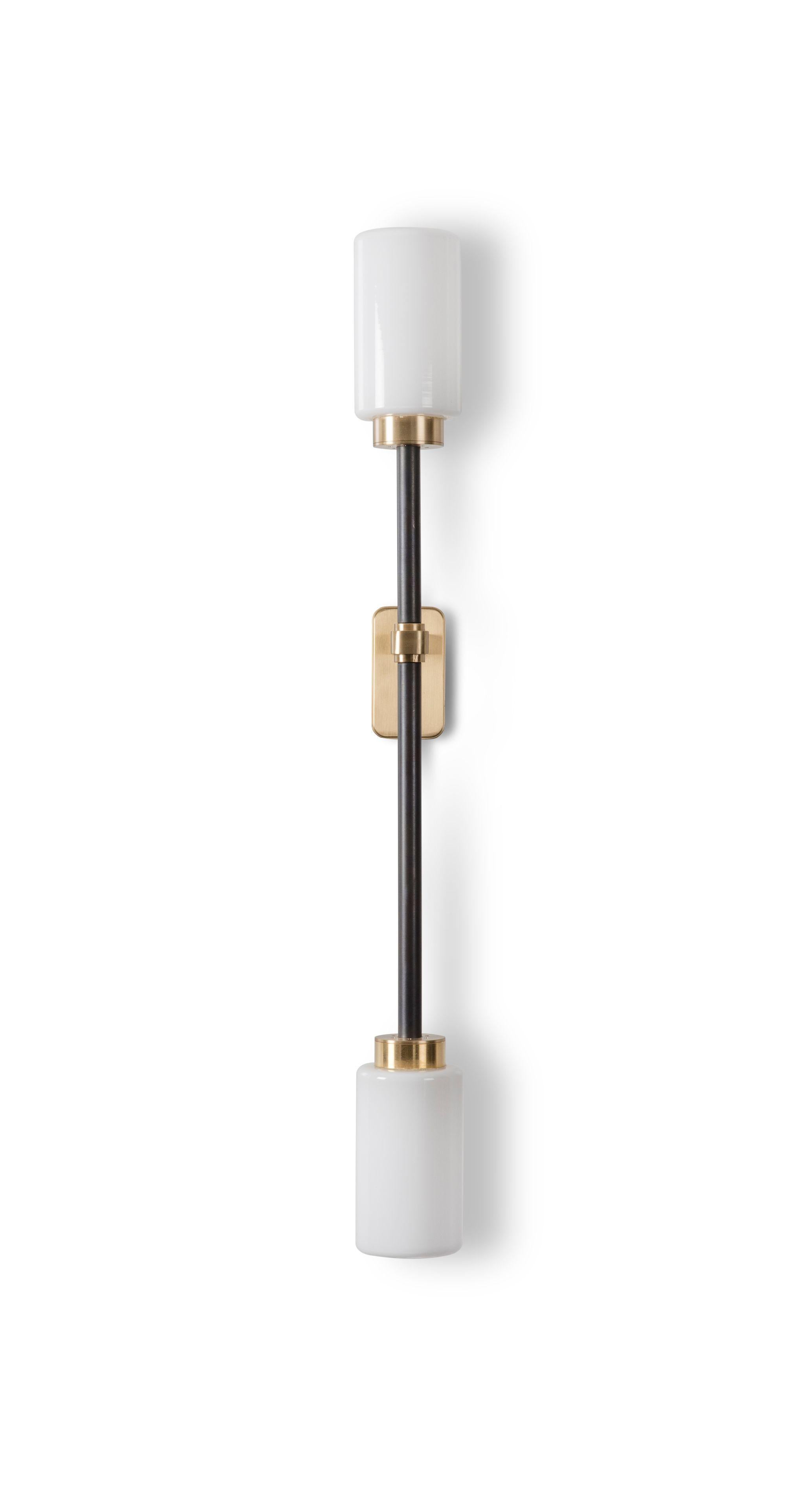 Opal Farol single wall light by Bert Frank
Dimensions: H 66 x W 10.5 x D 7 cm
Materials: Brass, bronze and opal

Available finishes: Bronzed brass, black brass
All our lamps can be wired according to each country. If sold to the USA it will be