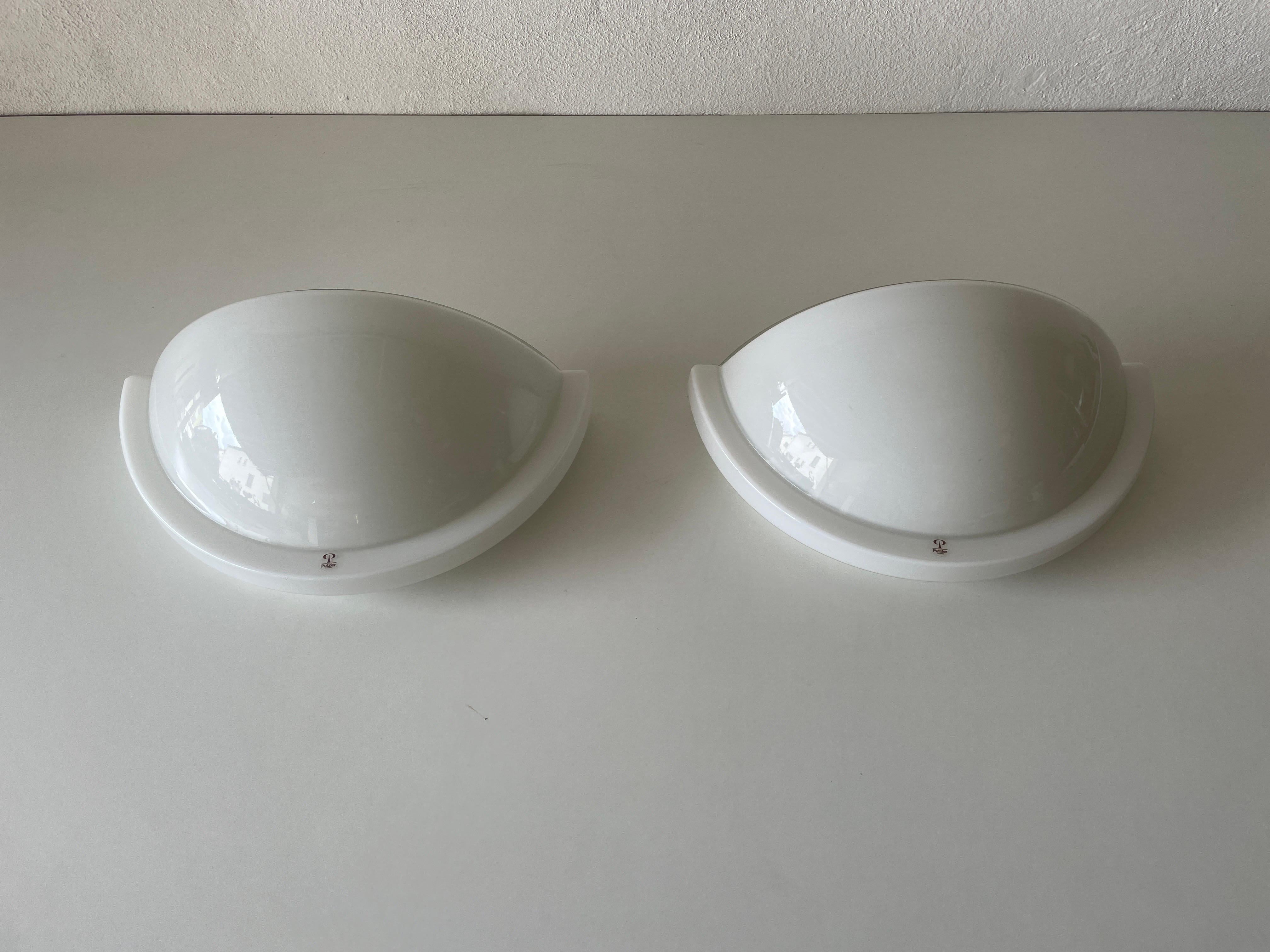 Opal Glass Half Circle Pair of Sconces by Peill and Putzler, 1970s, Germany

Very elegant and Minimalist wall lamps.

Lamps are in very good condition.

These lamps works with E27 standard light bulbs. Each lamp works with 1 light bulb. Max