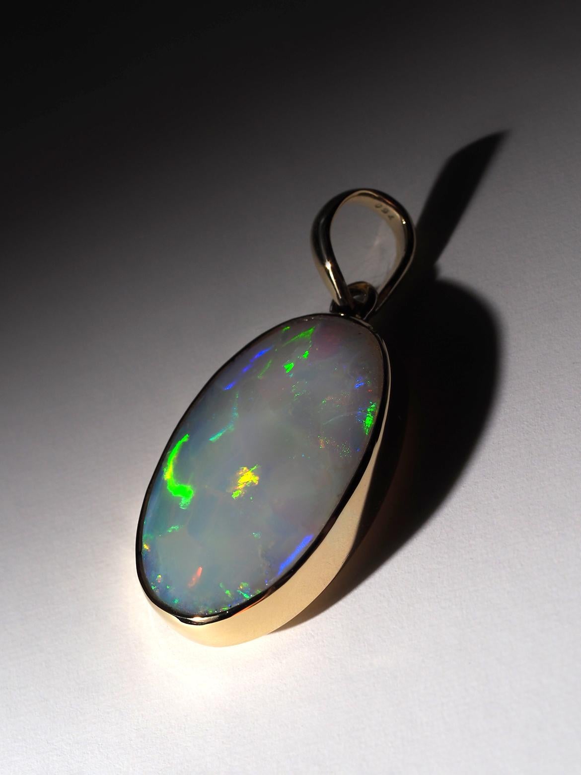 18K yellow gold necklace with natural fine quality Harlequin pattern Opal
opal origin - Australia
pendant weight - 4.8 grams
pendant height - 1.29 in / 36 mm
gemstone size - 0.59 x 0.90 in / 15 х 23 mm
ref No 24228

Worldwide shipping from Berlin,