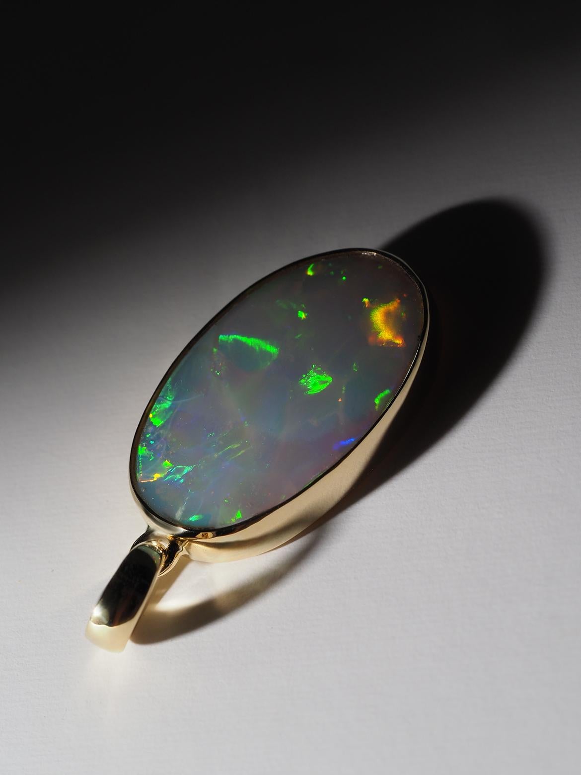 Oval Cut Opal Gold Necklace Harlequin pattern Opal wedding anniversary gift ideas For Sale