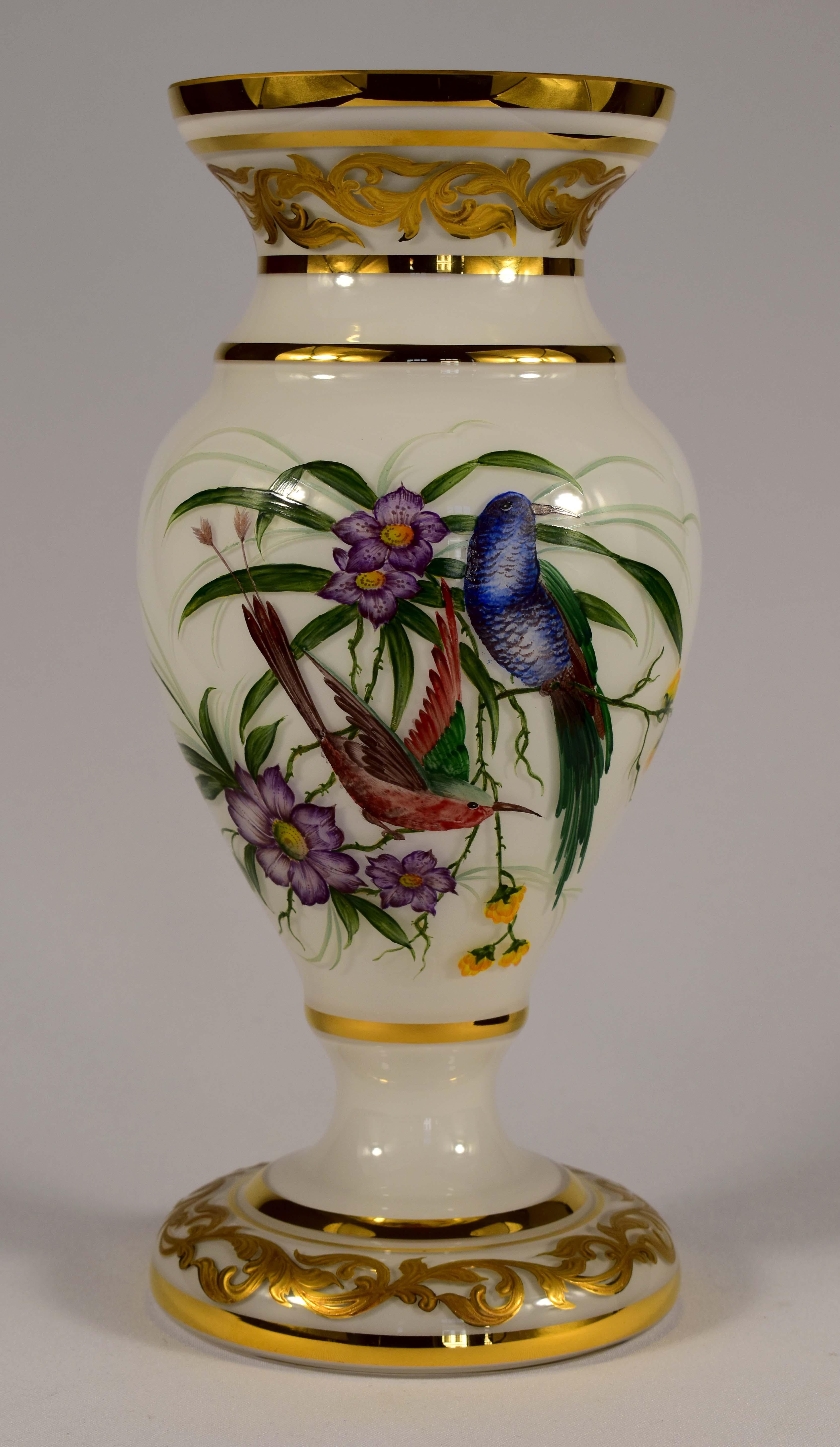 Hand painted opal glass vase with exoic bird and flower motif. It is 100% handmade using old techniques. It is Bohemian glass and Bohemian glassmakers were known for their quality. The vase is in good condition and is not damaged in any way.