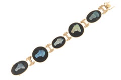Cavalli di Opale Bracciale in oro giallo 14 carati con diamanti e onice