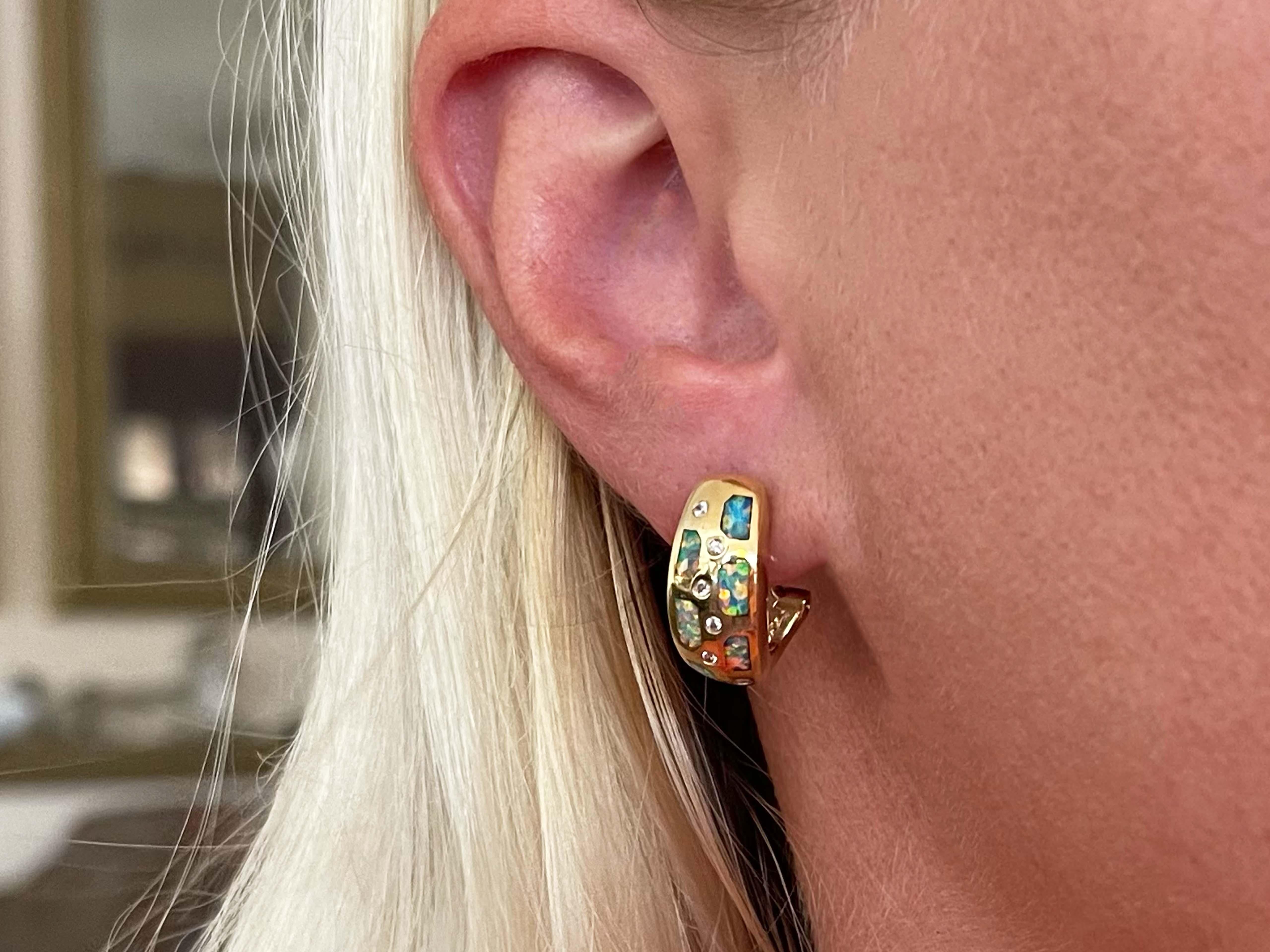 Earrings Specifications:

Metal: 14k Yellow Gold

Earring Diameter: 18 mm

Gemstone Inlay: Black Opal

Diamond Carat Weight: 0.12

Diamond Color: G-H

Diamond Clarity: SI1

Total Weight: 9.6 Grams

Stamped: 