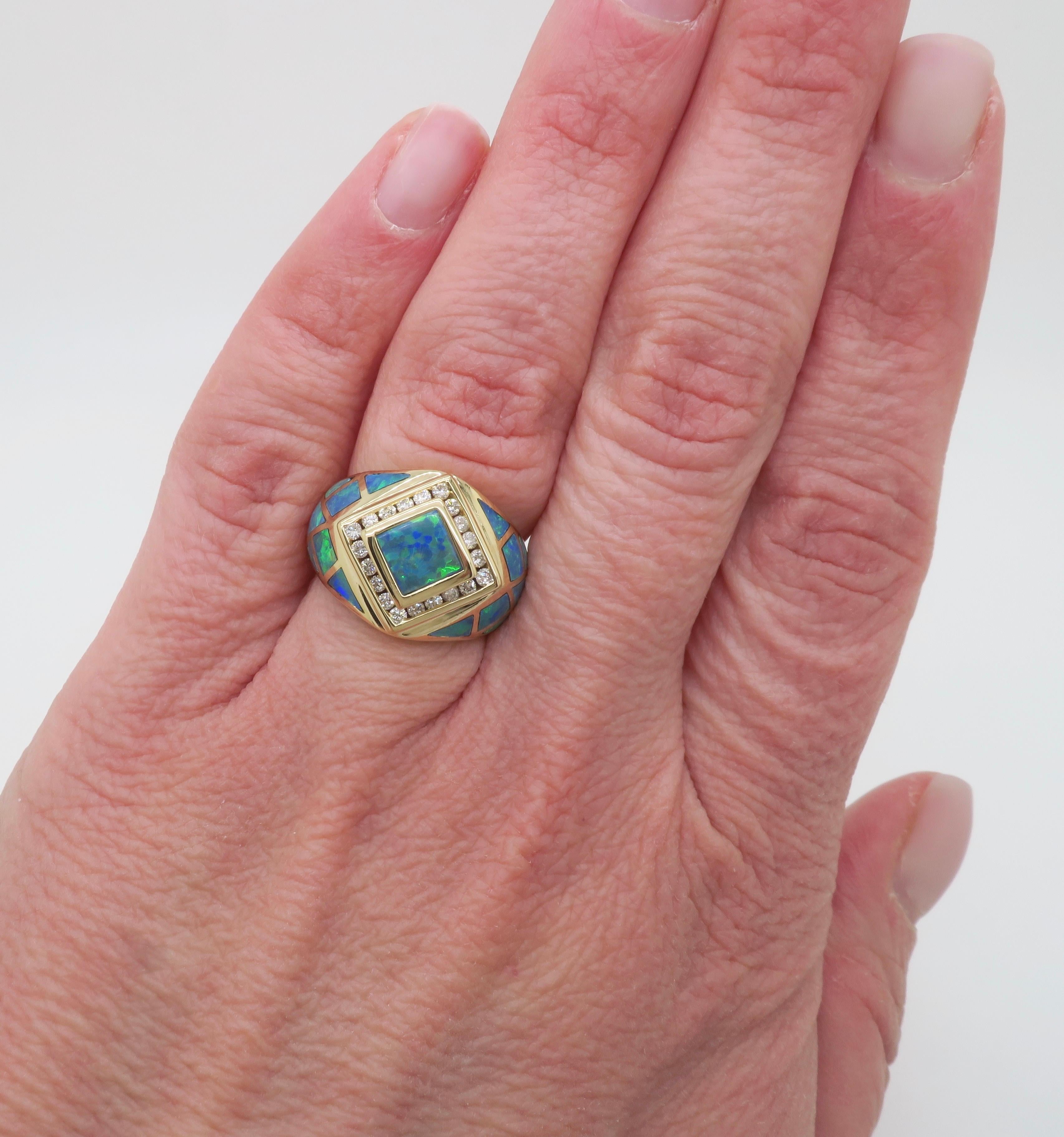 Opal inlay & diamond ring crafted in 14k yellow gold. 

Gemstone: Opal & Diamond
Diamond Carat Weight: .40CTW
Diamond Cut: Round Brilliant Cut 
Color: G-I
Clarity: VS1-SI2
Metal: 14K Yellow Gold 
Marked/Tested: Marked “14K